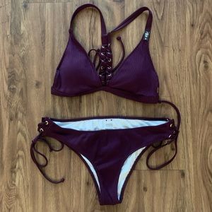 Victoria secret plum bathing suit w/ lace up back.